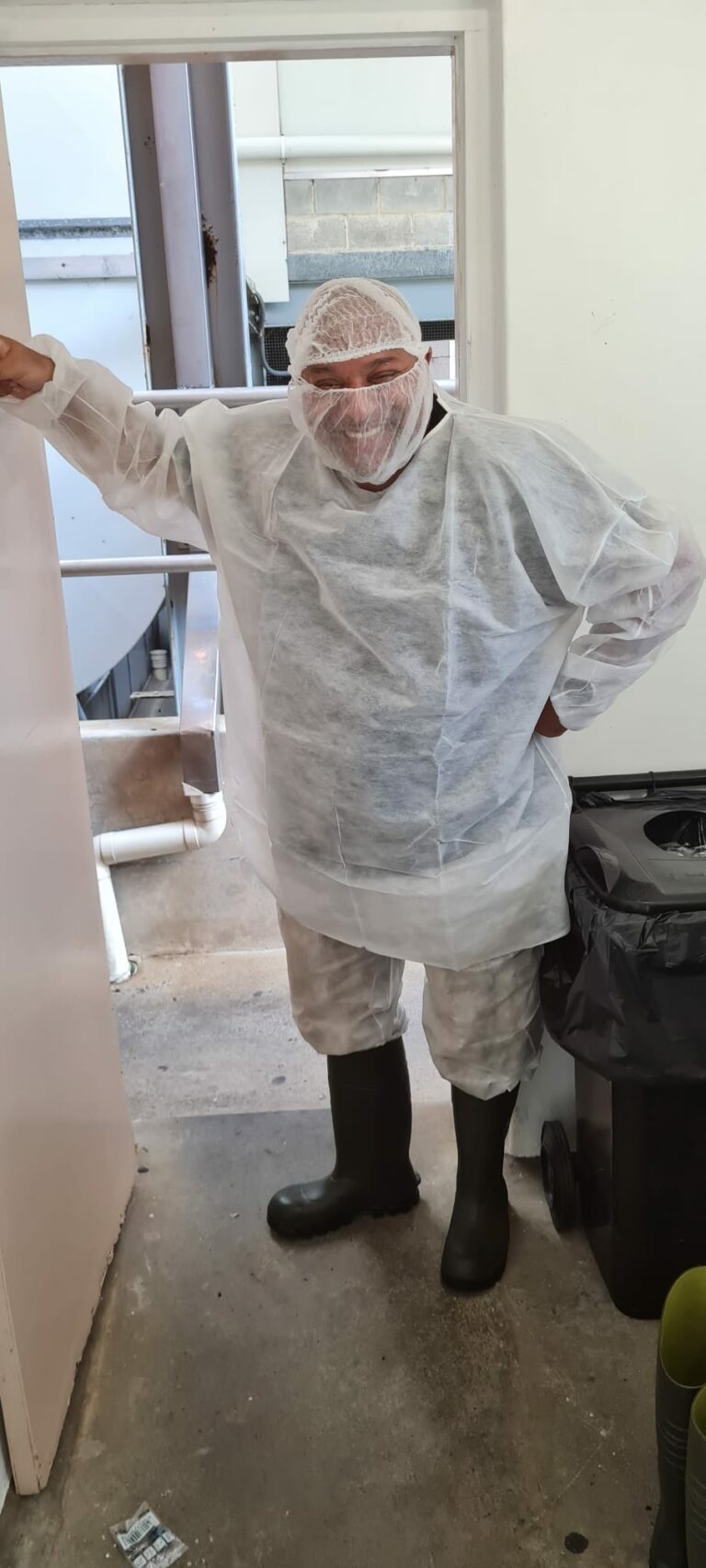 Sonny in full hygiene protective gear before entering the facility